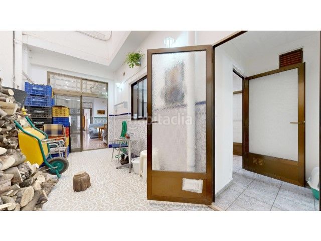 Foto b2b1cc3b-70f4-408b-bc18-639ce90dd4da. Casa amb piscina a Centre Alzira