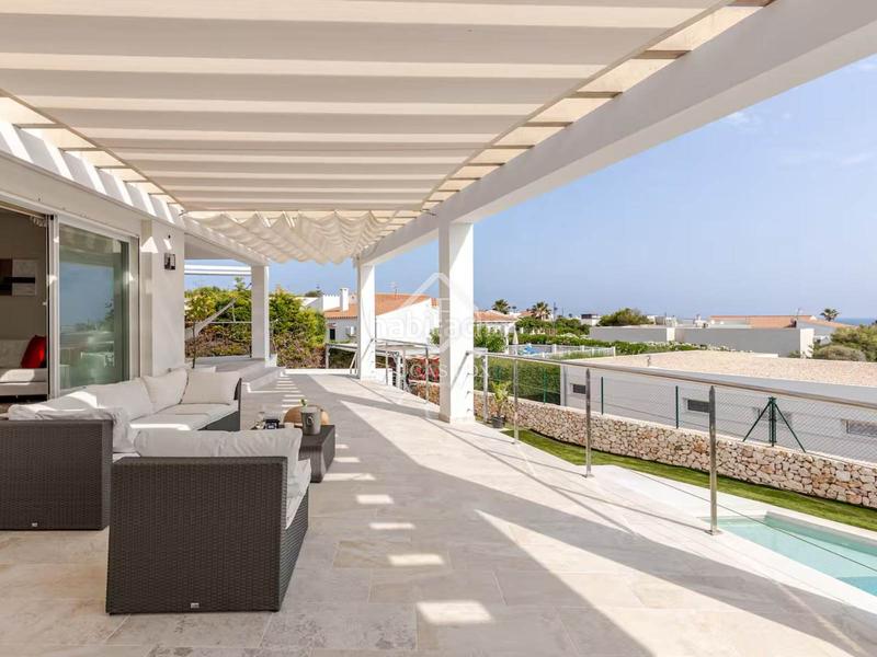 Foto 83b9b441-5fa4-4a2c-91f0-949af7c2ec2d. Xalet amb calefacció aparcament piscina a Biniancolla-Punta Prima Sant Lluís