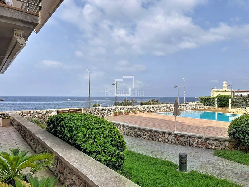Foto 05ff10cc-1dca-4a45-a2ce-6346aebe1f9e. Piso  en planta baja de 4 dormitorios con terraza de 70 m y espectaculares vistas al mar en venta en Ciutadella de Menorca