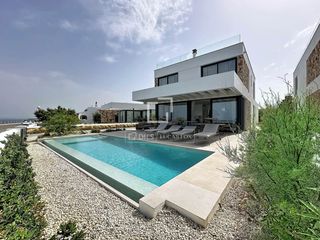 Lloguer Xalet a Cala d´En Bosch-Serpentona. Espectacular villa de obra nueva con 4 dormitorios y vistas al m