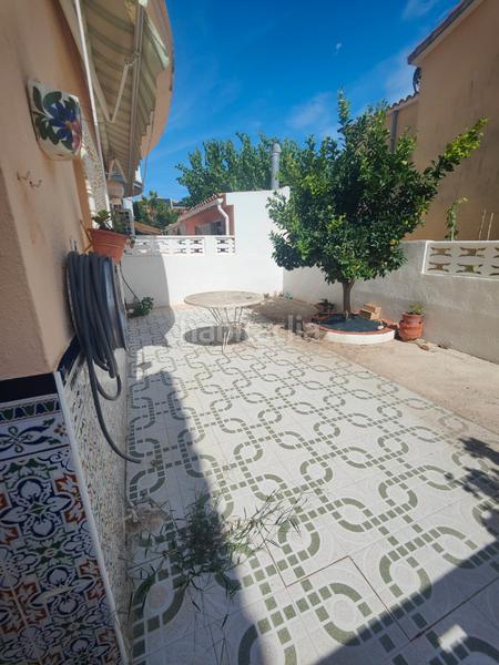 Foto 668ee86b-c104-44b4-8d6f-fe4140dda27e. Casa aparellada amb calefacció aparcament a Les Salines Vinaròs