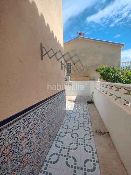 Foto 9bf69393-463d-42c9-aff3-f71127c905b8. Casa aparellada amb calefacció aparcament a Les Salines Vinaròs