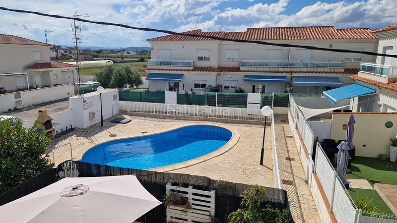 Foto 87de5b34-2b78-4762-b291-f58337b5cdab. Casa  adosada en urbanización con piscina en Costa Norte Vinaròs
