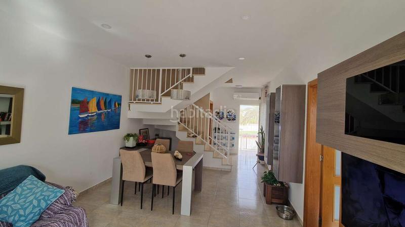 Foto f46f0cac-c40b-44e3-8449-89a4cd4bbd23. Casa  adosada en urbanización con piscina en Costa Norte Vinaròs