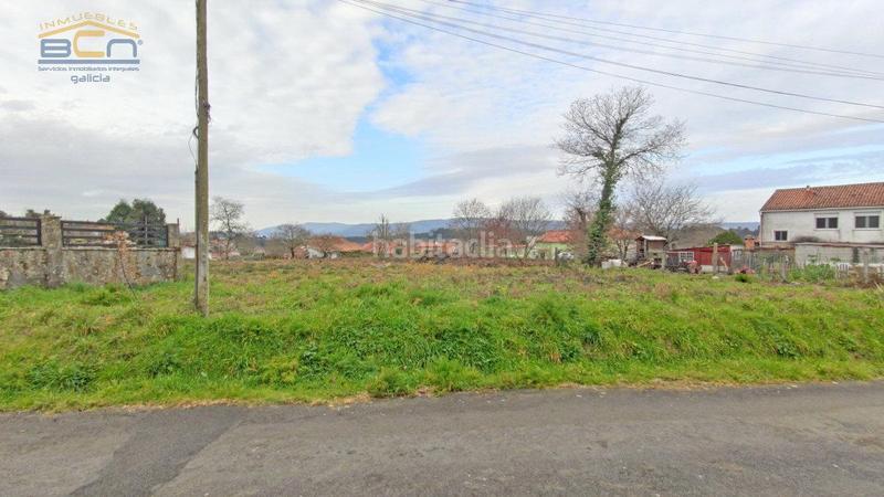 Foto 5e1bd330-5f1e-4903-a0bc-56cd388ddc7c. Terrain résidentiel dans O Milladoiro Ames