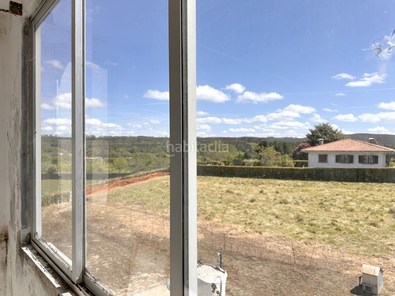 Foto d82a86a4-507d-4d99-89c4-f7c4a5495225. Casa amb aparcament a Baña (A)