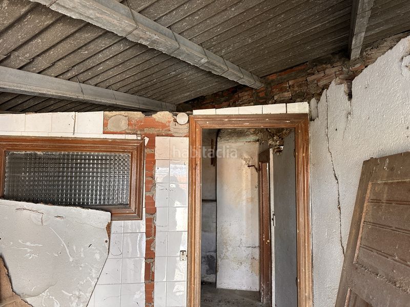 Foto d3cf711d-a76e-4517-bc5f-1600fe1c4e68. Casa adossada a Noia