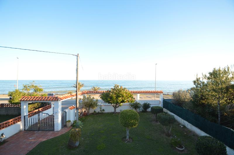 Foto 4c010ce3-5e1a-4651-986e-168b815860dd. Chalet  en venta, primera línea de mar, (castellón) en Vinaròs