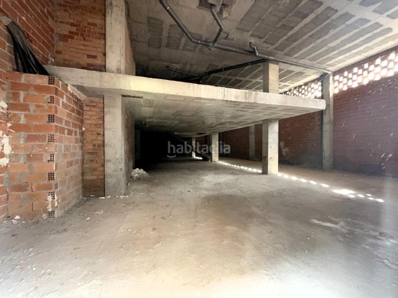 Foto 1c23ebd6-0325-449c-9c89-d8d8c3a6c428. Local comercial en calle en miquel v arnau abad 9 amplio local comercial en bruto con doble altura y 35 metros de fachada en Vall d´Uixó (la)
