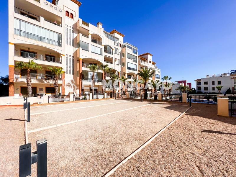 Foto f3bb6c32-5704-46b5-b30e-b864d8906555. Piccolo appartamento con riscaldamento parcheggio piscina in Guardamar del Segura