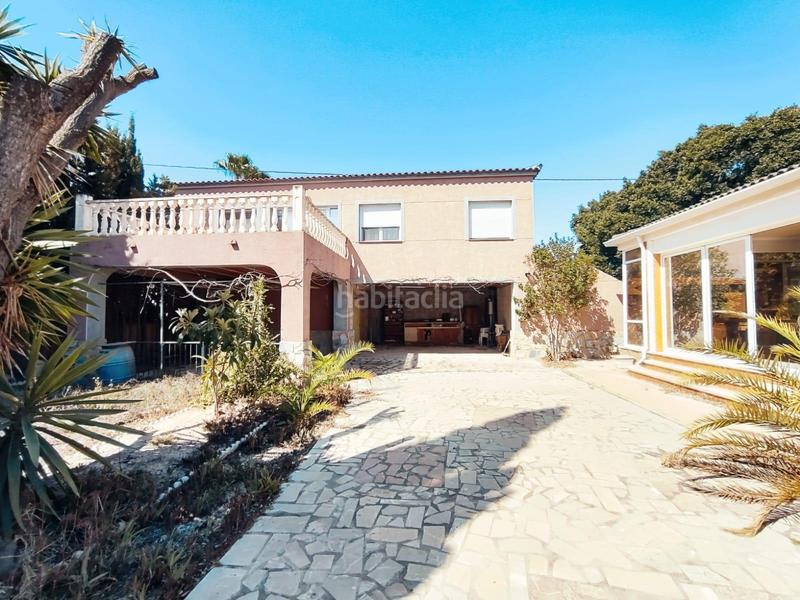 Foto 5df13d7d-693e-48e6-abc4-d8d7e9a46a26. Chalet con parcheggio piscina in La Marina Elche / Elx