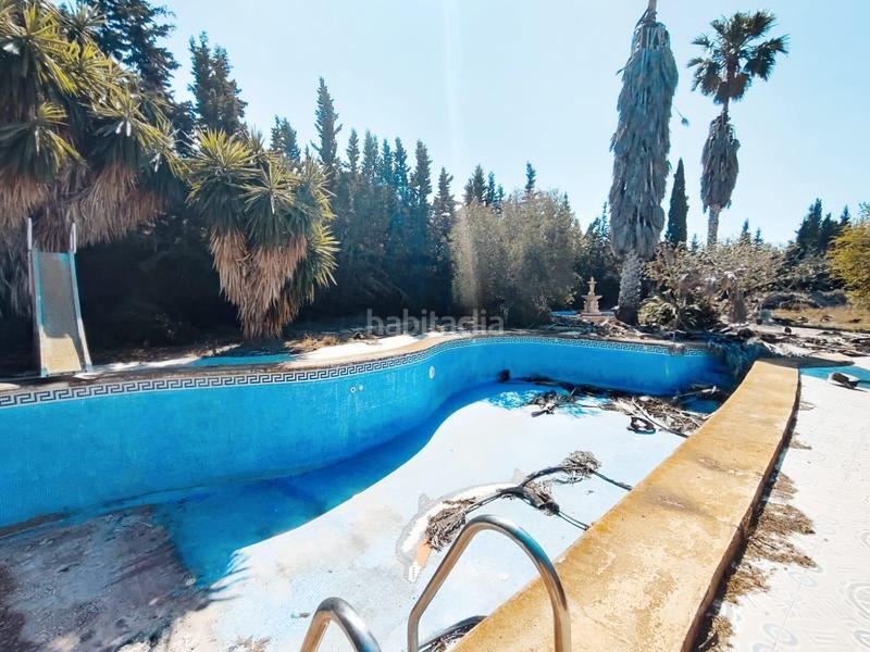 Foto a0fed477-de08-402b-a55e-be1c861c2179. Chalet con parcheggio piscina in La Marina Elche / Elx