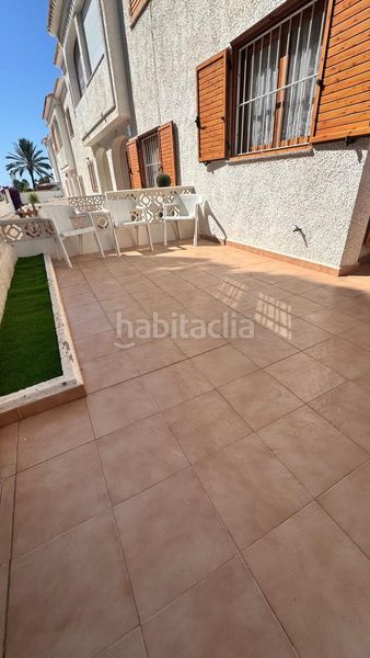 Foto 2d3f90eb-bc81-4473-9b00-11a7b0f6b888. Casa adossada amb aparcament a Playa Flamenca Orihuela