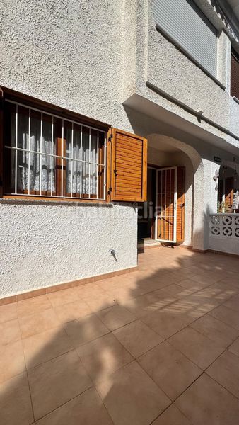 Foto 4debae49-d7ee-404c-a807-0e6e8309d66f. Casa adossada amb aparcament a Playa Flamenca Orihuela