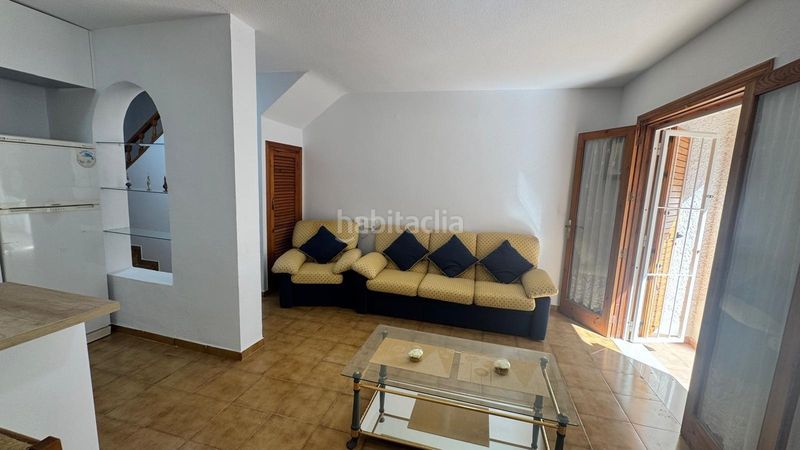 Foto 6bbf67a8-94bb-4362-888f-a8699a11f13c. Casa adossada amb aparcament a Playa Flamenca Orihuela