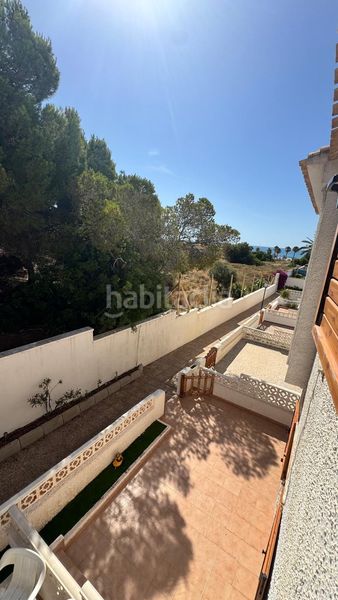 Foto e4c5c485-8e16-4d0a-8ecd-fe1518675b51. Casa adossada amb aparcament a Playa Flamenca Orihuela