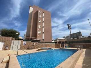 Ground floor in Puerto Deportivo. Apartamento en planta baja con jardín privado, piscina, garaje y
