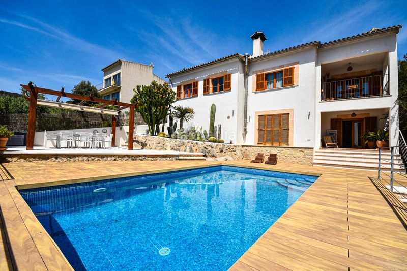 Foto 2064cd1f-2ec0-4719-80bd-a9eabbeada80. Casa encantadora casa de pueblo con terreno y piscina además de unas magníficas vistas a las montañas y al pintoresco pueblo de esporl en Esporles
