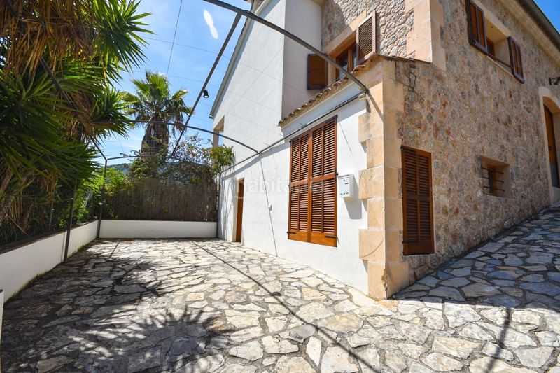 Foto 2e2a286f-b3c6-42a0-9f66-15b56417684d. Casa encantadora casa de pueblo con terreno y piscina además de unas magníficas vistas a las montañas y al pintoresco pueblo de esporl en Esporles