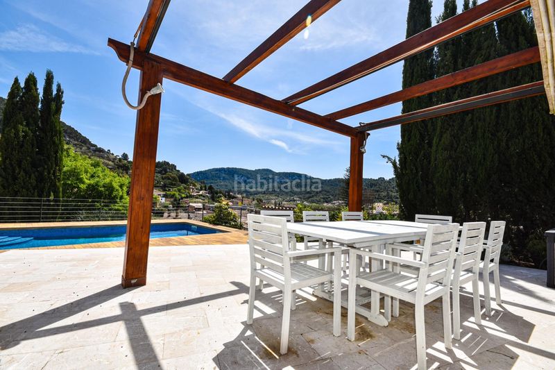 Foto 3353f859-5709-44db-a60a-6bd21bef94ce. Casa encantadora casa de pueblo con terreno y piscina además de unas magníficas vistas a las montañas y al pintoresco pueblo de esporl en Esporles