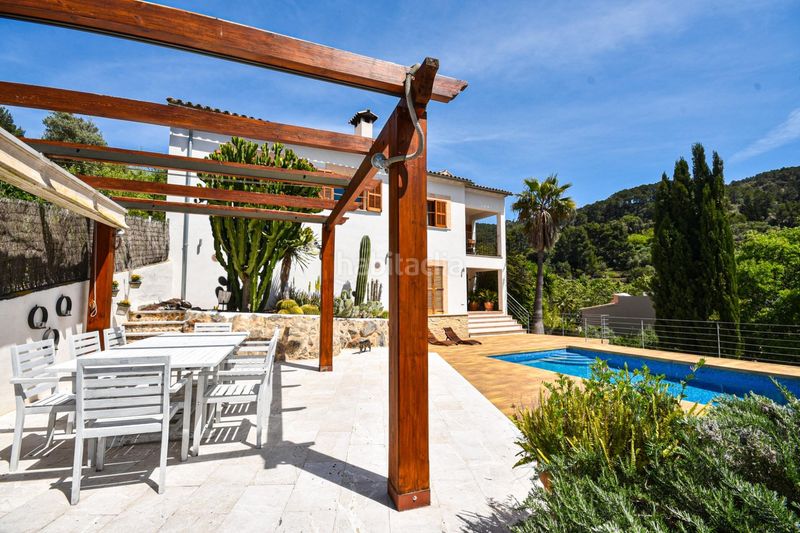 Foto 75942583-49f3-4f91-aaf4-336d04165c32. Casa encantadora casa de pueblo con terreno y piscina además de unas magníficas vistas a las montañas y al pintoresco pueblo de esporl en Esporles