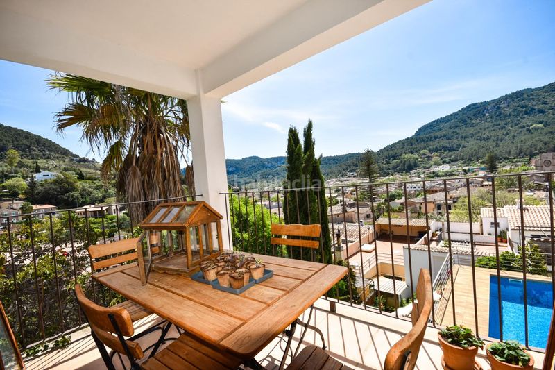 Foto 8ff264db-e588-4177-97e8-ca5a1fd58538. Casa encantadora casa de pueblo con terreno y piscina además de unas magníficas vistas a las montañas y al pintoresco pueblo de esporl en Esporles