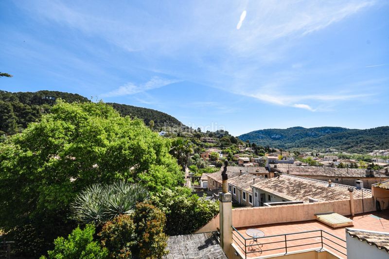 Foto b87909be-fa6a-4432-bdd6-ebab23599bcf. Casa encantadora casa de pueblo con terreno y piscina además de unas magníficas vistas a las montañas y al pintoresco pueblo de esporl en Esporles