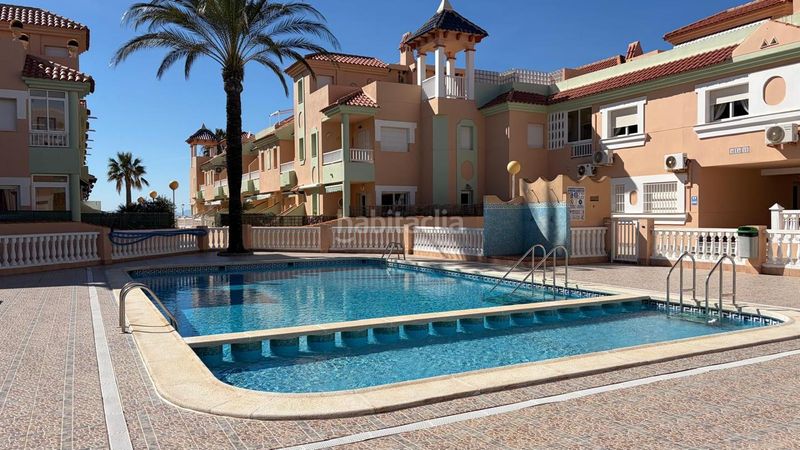 Foto 6ddd20a5-9a6c-4642-bac7-0dbf2ad6881f. Dúplex amb calefacció aparcament piscina a Tomás Maestre Manga del Mar Menor (La)