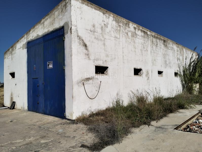 Foto c2187fb2-64f7-4f2a-a7e1-28fef381c098. Nau industrial a vía pista 58 a Sueca Sueca