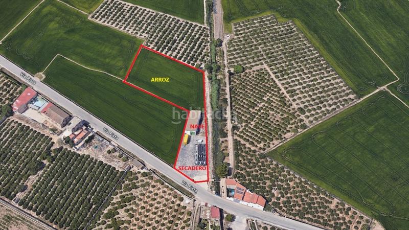 Foto ded6e7ec-95df-4303-8b10-2a336be44944. Nau industrial a vía pista 58 a Sueca Sueca