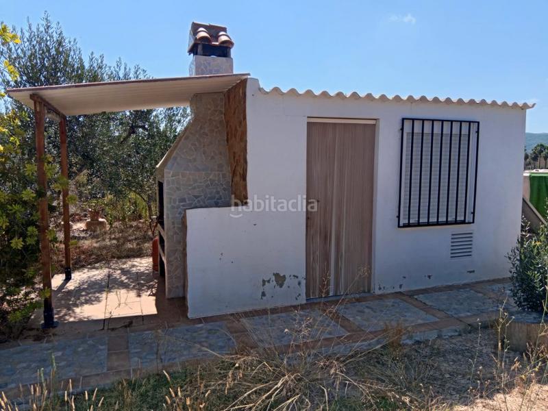 Foto 0510edf9-72d6-469a-8d74-5f8230e3f943. Bauernhof mit kamin parking in Calles