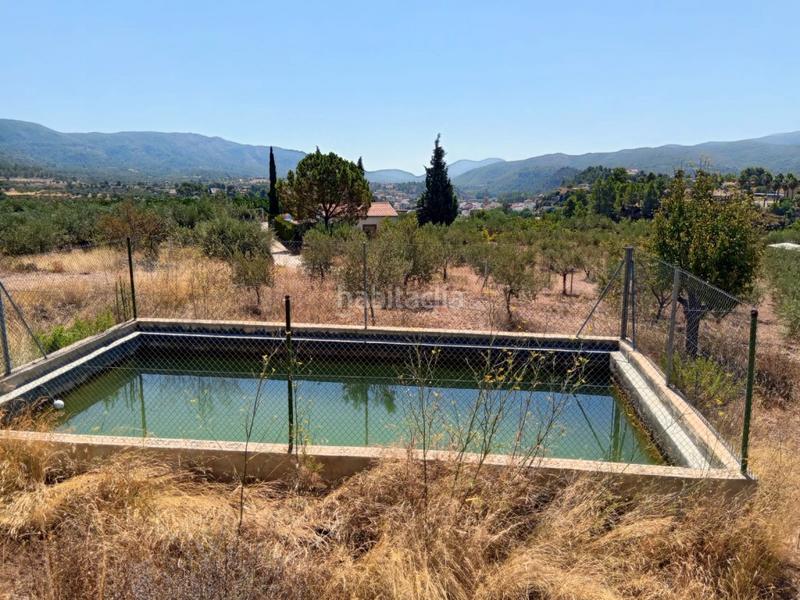 Foto 1f6b7b9f-335a-4719-bd6d-3b1faa6bd442. Bauernhof mit kamin parking in Calles