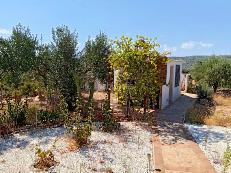 Foto a359e881-ad32-4785-b00f-4659c373bb0e. Bauernhof mit kamin parking in Calles