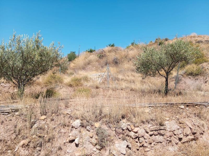 Foto dc004074-7fd3-461f-90bb-8769b707ab96. Bauernhof mit kamin parking in Calles