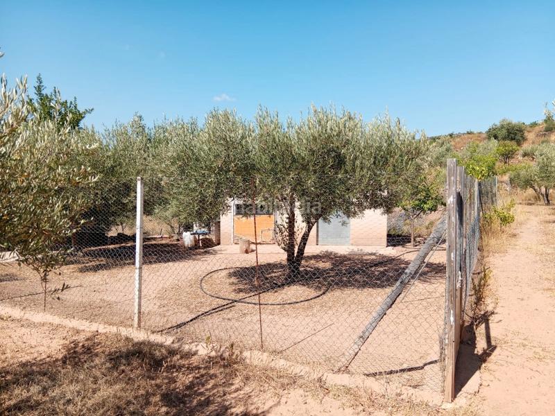 Foto ec7cf6cc-31db-485f-8c3b-85e40b26f118. Bauernhof mit kamin parking in Calles