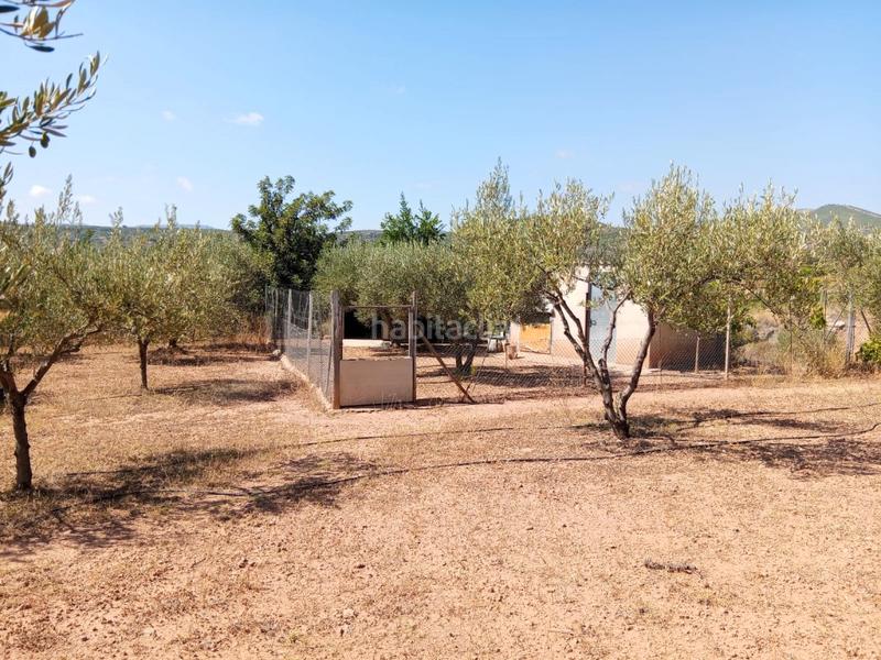 Foto ed58bd1d-991e-4385-b8fc-7c0c4cfafbee. Bauernhof mit kamin parking in Calles