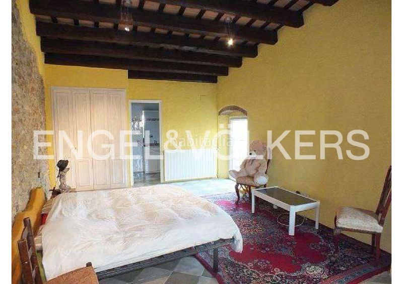 Foto 4f6ab418-b939-469c-9f5c-b939aa605a54. Casa adosada casa rústica de piedra con patio y garaje , alt empordà en Vilajuïga