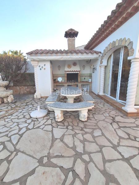 Foto 0bd59f14-8575-4b45-8770-43b8291b0c17. Chalet avec cheminée chauffage parking piscine dans Miami Platja