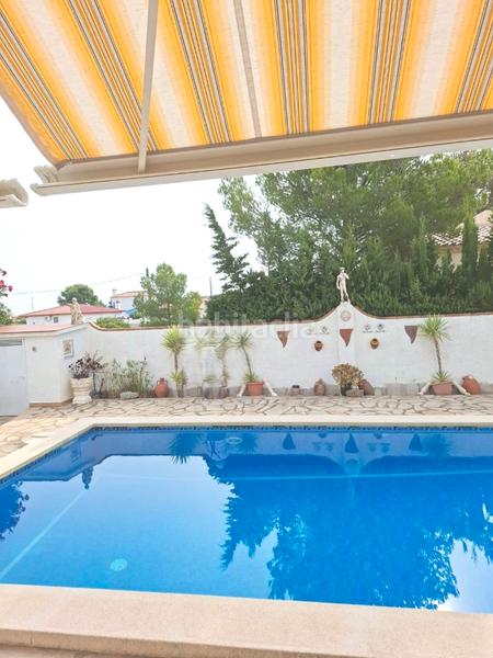 Foto 0d2c7235-8ea8-49d3-b16e-986d13134799. Chalet avec cheminée chauffage parking piscine dans Miami Platja