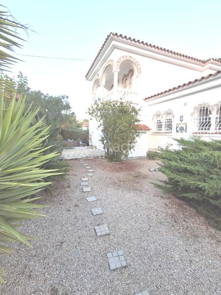 Foto 699a9696-a571-4fb3-ab98-b3f45f334667. Chalet avec cheminée chauffage parking piscine dans Miami Platja