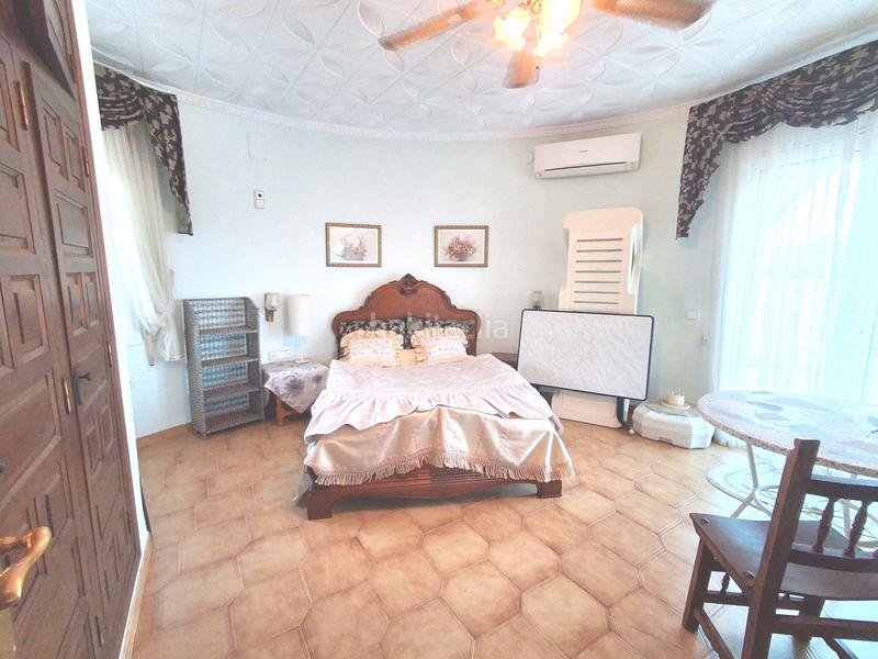 Foto f7afa4f5-28df-429d-a564-7beb68c93222. Chalet avec cheminée chauffage parking piscine dans Miami Platja