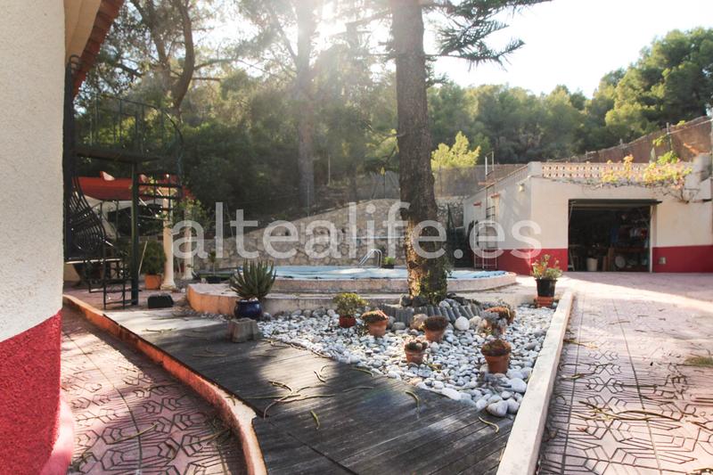 Foto a39b9b04-a6cb-4922-83bd-0b16baf12273. Casa a schiera con parcheggio piscina in Mascarat Altea