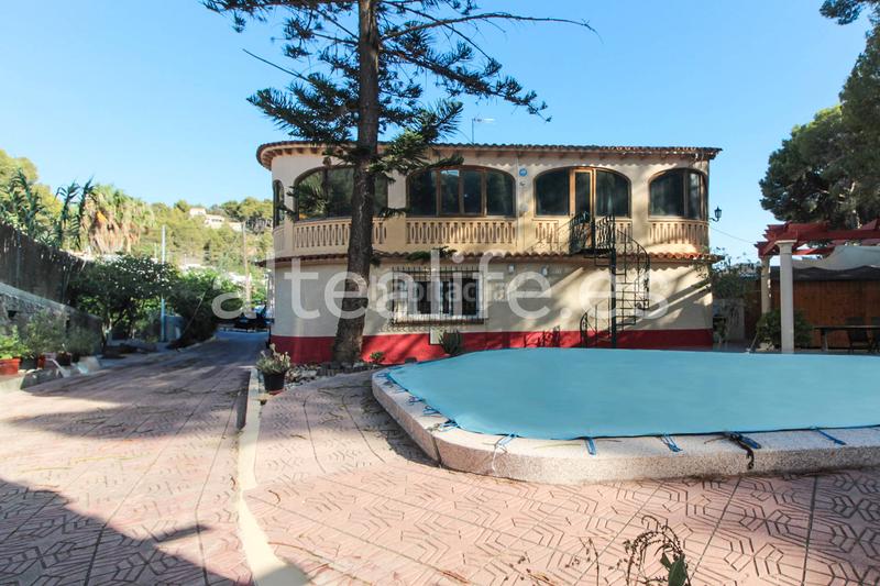 Foto becc5e73-2c1a-4fd3-8829-afa8c66c1cb9. Casa a schiera con parcheggio piscina in Mascarat Altea