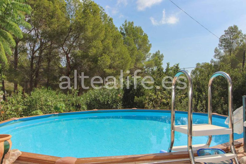 Foto e9ac6d77-cbeb-4fff-9a63-0d9819185238. Casa amb xemeneia aparcament piscina a Altea la vella Altea
