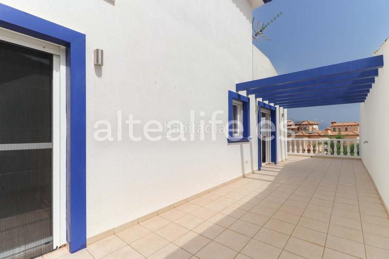 Foto 25bc0614-8bb7-460d-b046-ad8e7a2b96e9. Casa a schiera con riscaldamento parcheggio piscina in Alfàs del Pi (l´)