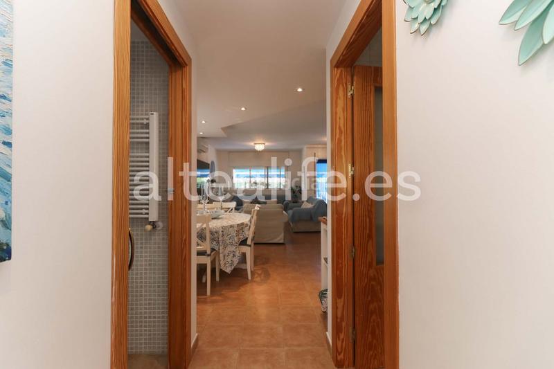 Foto 5238c423-2a17-47db-8ec7-77f266d19530. Casa a schiera con riscaldamento parcheggio piscina in Alfàs del Pi (l´)