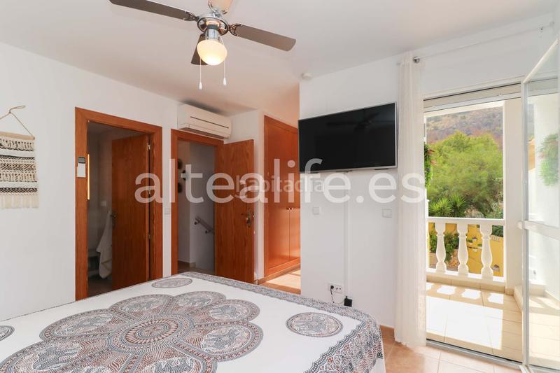 Foto bd6eb4aa-1707-4d27-ada8-f7decd37cbb2. Casa a schiera con riscaldamento parcheggio piscina in Alfàs del Pi (l´)