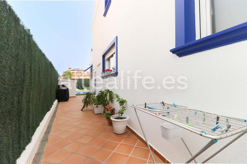 Foto d38df14e-bb64-405e-9a14-63985c254e38. Casa a schiera con riscaldamento parcheggio piscina in Alfàs del Pi (l´)