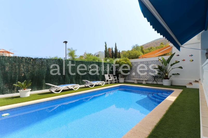 Foto f7df6996-ccc1-42bf-8539-9d253d50d8f0. Casa a schiera con riscaldamento parcheggio piscina in Alfàs del Pi (l´)