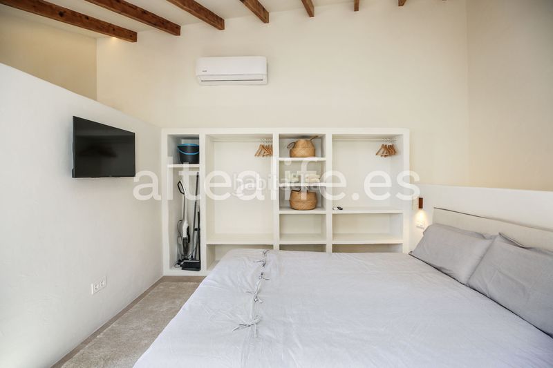 Foto 2d4f2a15-49a2-44e2-883a-436d71b87a6b. Casa adossada amb xemeneia a Altea ciudad Altea